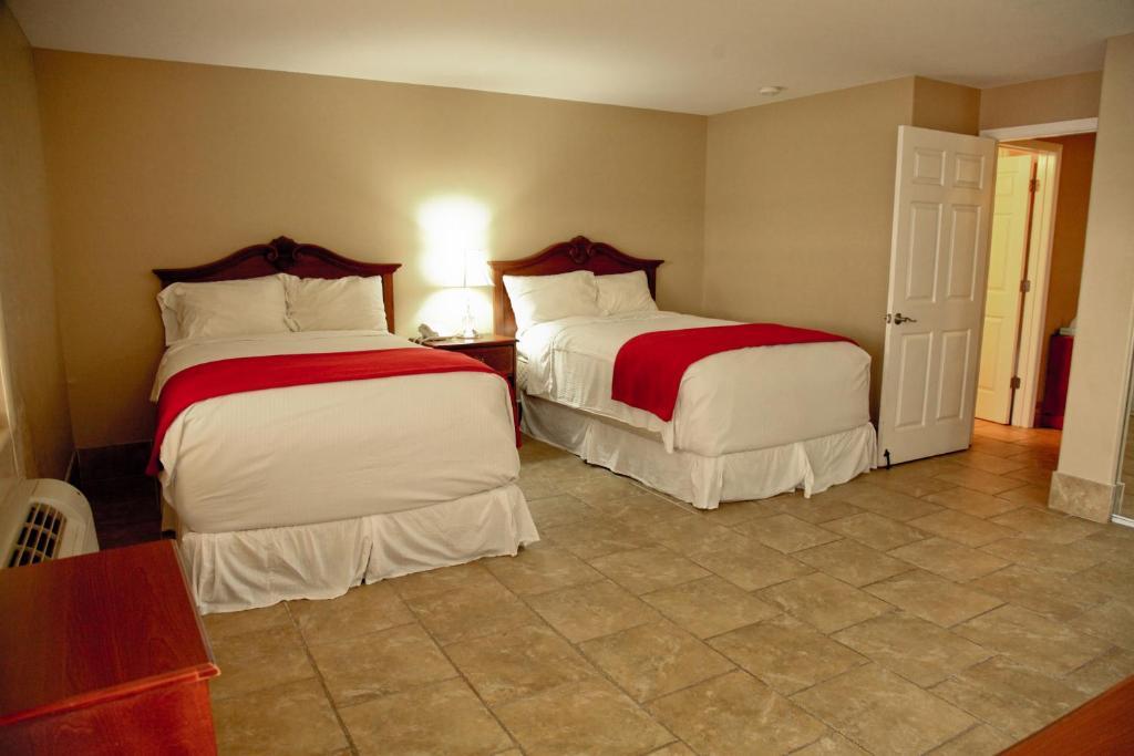 לייק פלאסיד Lake Grassy Inn & Suites חדר תמונה